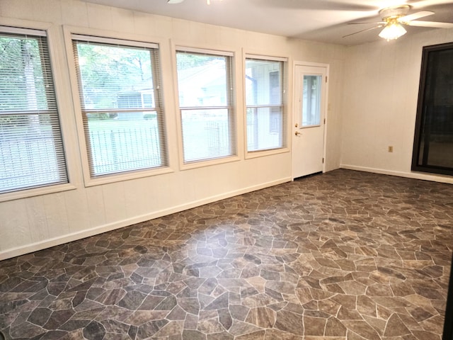 spare room featuring ceiling fan