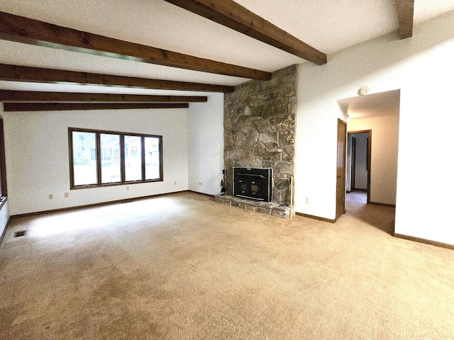 unfurnished living room with light carpet, lofted ceiling with beams, and a stone fireplace