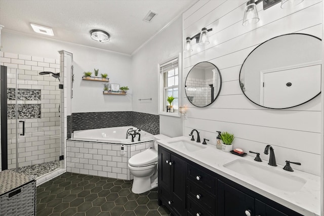 full bathroom featuring a garden tub, visible vents, a sink, and toilet