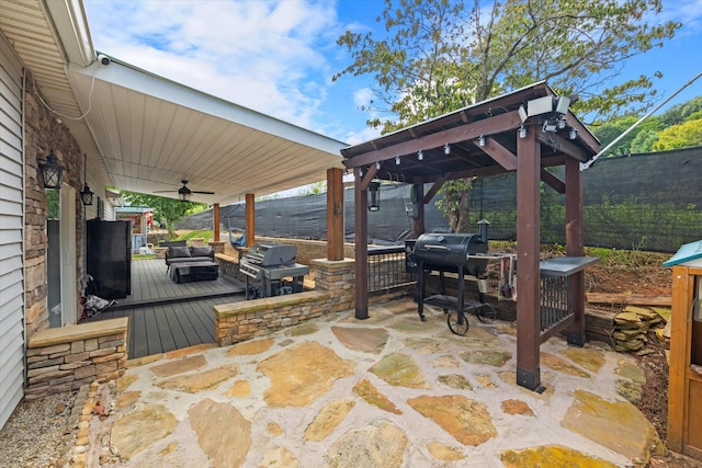 view of patio / terrace featuring a ceiling fan, a fenced backyard, a grill, and outdoor lounge area