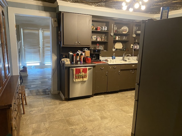 kitchen with appliances with stainless steel finishes, crown molding, sink, and light wood-type flooring