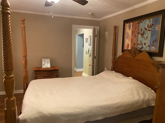 bedroom featuring a textured ceiling, ceiling fan, crown molding, and hardwood / wood-style flooring