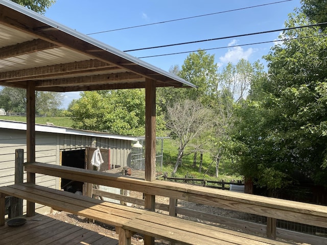 deck with an outbuilding