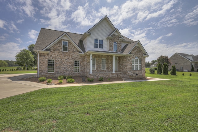 craftsman house featuring a front yard