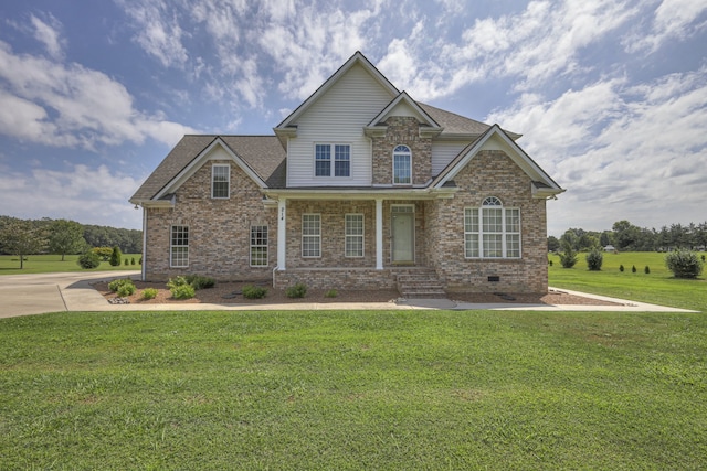 craftsman inspired home with a front yard and a porch