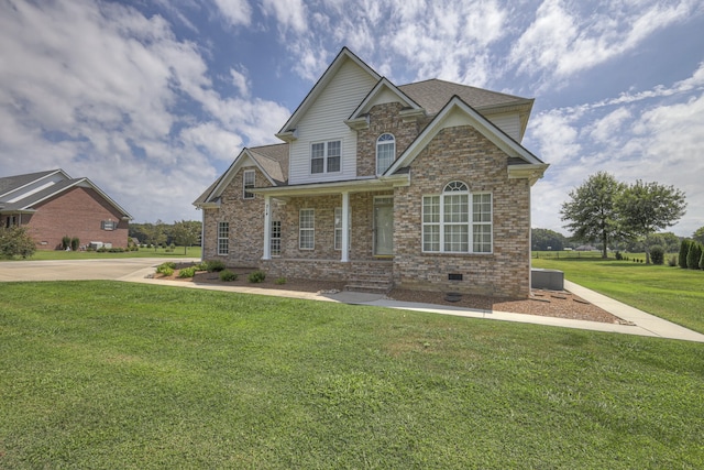 craftsman-style house featuring a front lawn