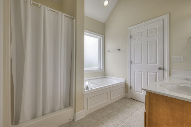 bathroom featuring vaulted ceiling, tile patterned flooring, independent shower and bath, and vanity