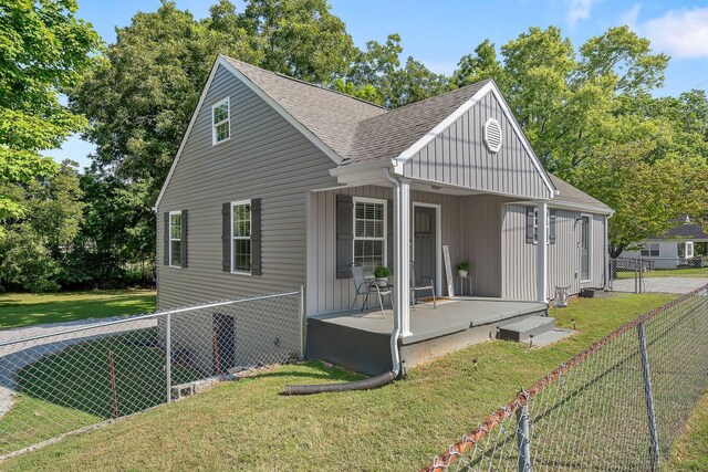 view of home's exterior with a yard