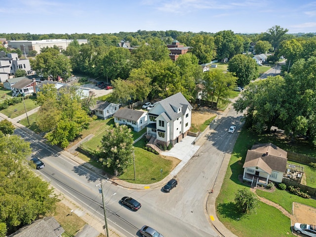 birds eye view of property with a residential view