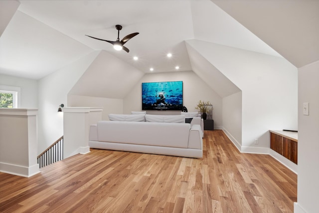 bonus room featuring light wood finished floors, baseboards, lofted ceiling, ceiling fan, and recessed lighting