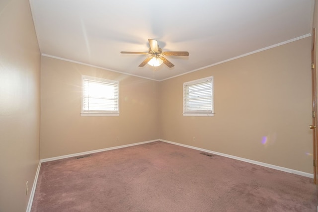 unfurnished room featuring carpet, plenty of natural light, and ceiling fan