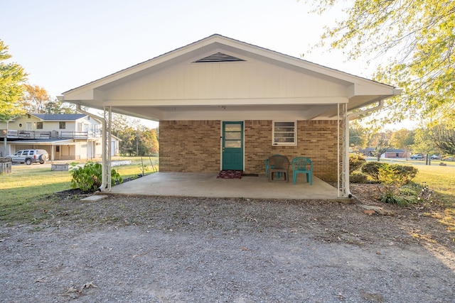 back of house with a patio area