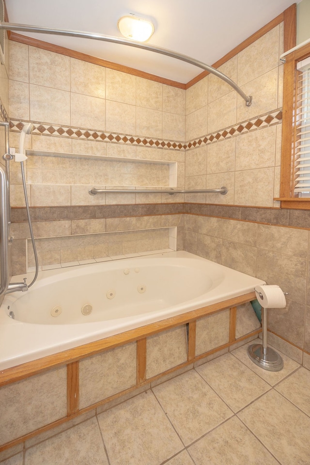 bathroom with tile patterned floors and tiled shower / bath