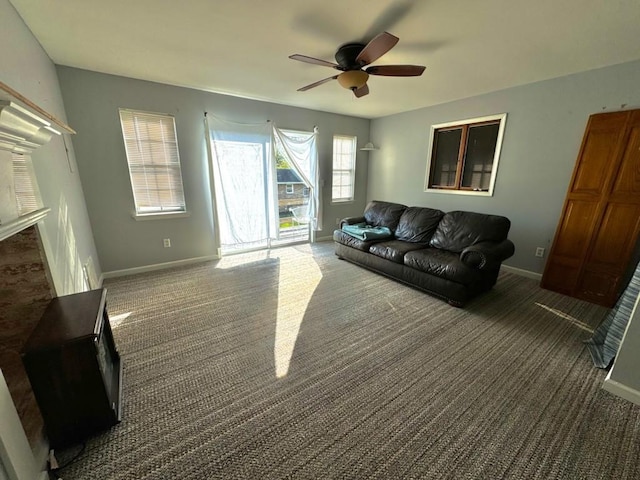 carpeted living room featuring ceiling fan