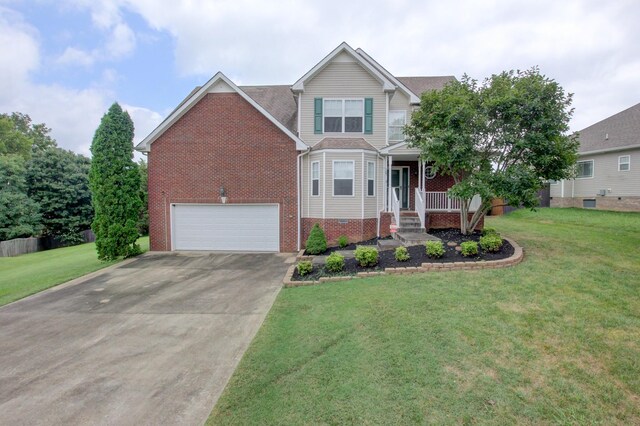 view of front facade with a front lawn and a garage