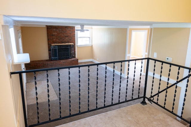 interior space with tile patterned flooring and a brick fireplace