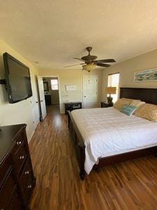 bedroom featuring ceiling fan and wood finished floors