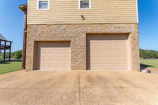 garage with driveway