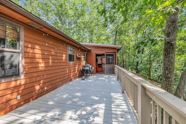 wooden terrace with grilling area