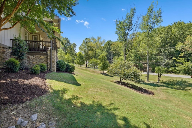 view of yard featuring a wooden deck