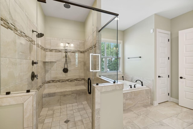 bathroom with a shower stall and a bath