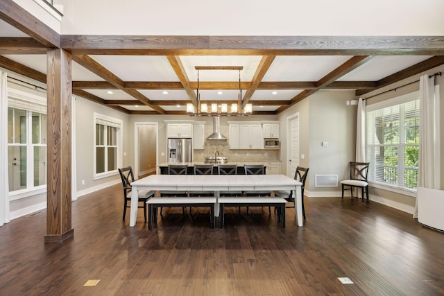 dining space with dark wood-style flooring, coffered ceiling, and baseboards