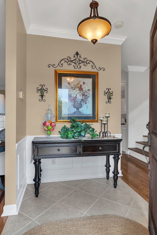 interior space featuring crown molding and wood-type flooring