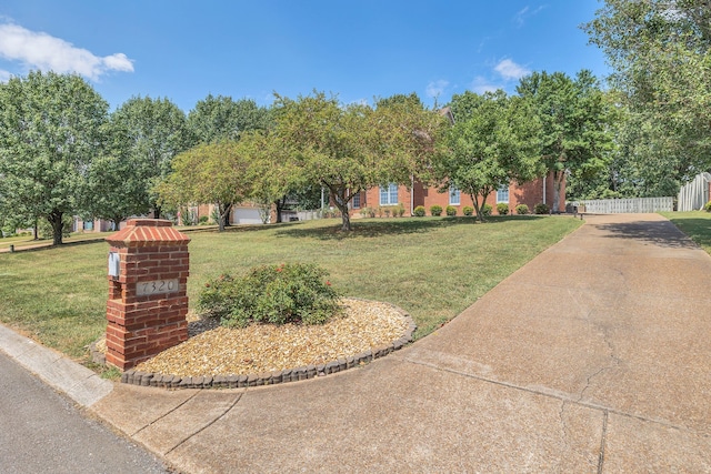 exterior space featuring a front yard