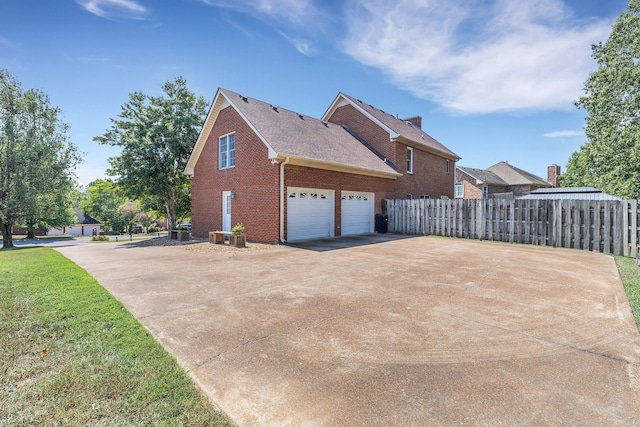 view of home's exterior featuring a garage