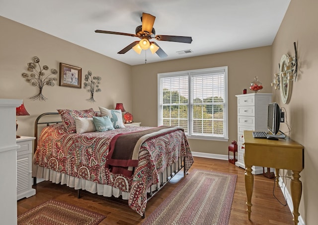 bedroom featuring ceiling fan and wood-type flooring