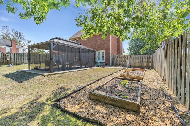 view of yard featuring a gazebo and a patio area