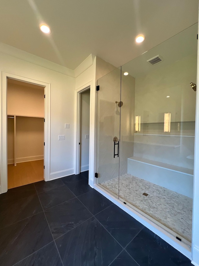 full bath with a shower stall, recessed lighting, visible vents, and baseboards