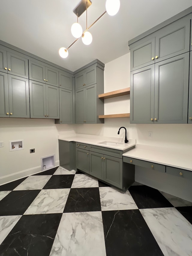 kitchen with sink and light stone countertops