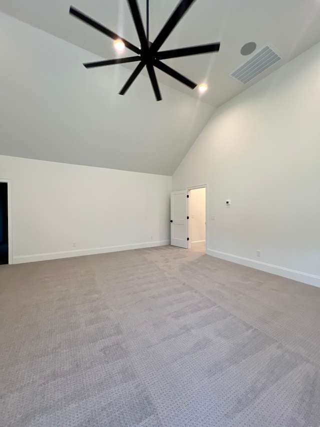 bonus room with lofted ceiling, light carpet, and ceiling fan