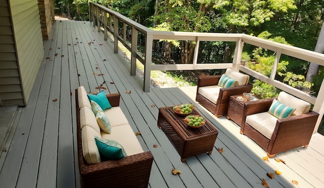 deck featuring outdoor lounge area