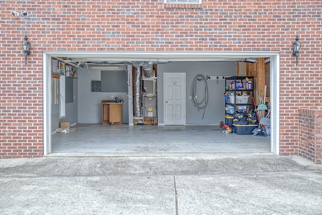 garage featuring heating unit