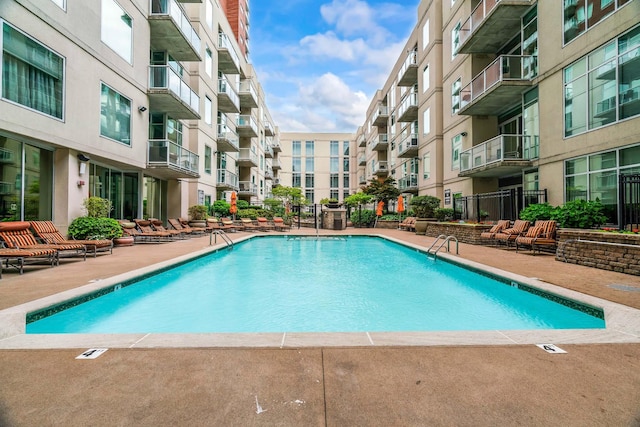 pool with a patio
