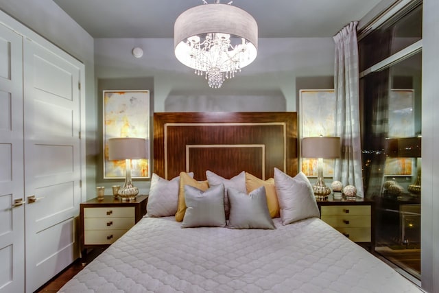 bedroom with a chandelier