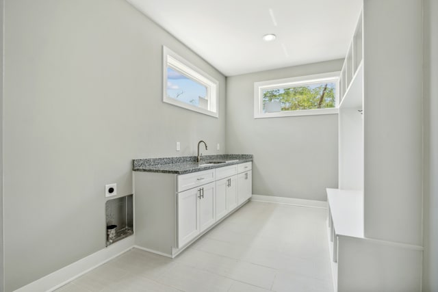 bathroom with vanity and a healthy amount of sunlight