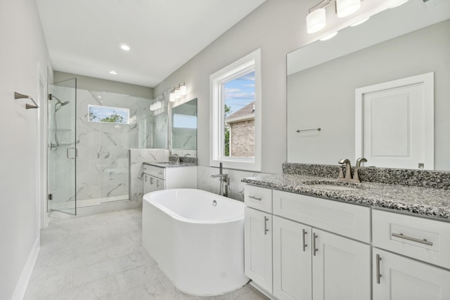 full bath featuring a marble finish shower, a soaking tub, marble finish floor, vanity, and recessed lighting