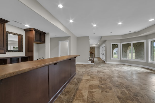 kitchen featuring visible vents, baseboards, dark brown cabinets, and recessed lighting