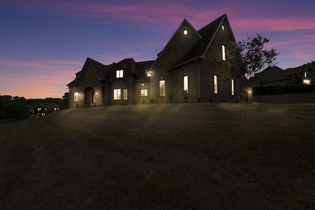 view of front facade with a lawn