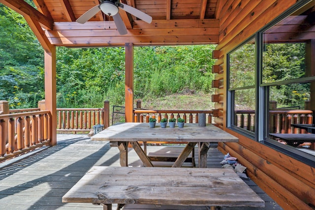 wooden deck with ceiling fan