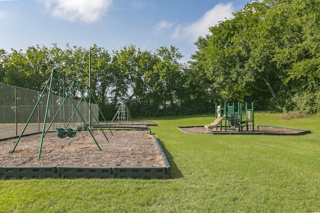 view of playground with a yard