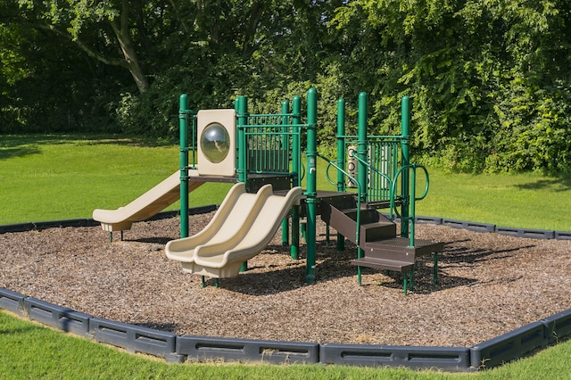 view of playground with a yard