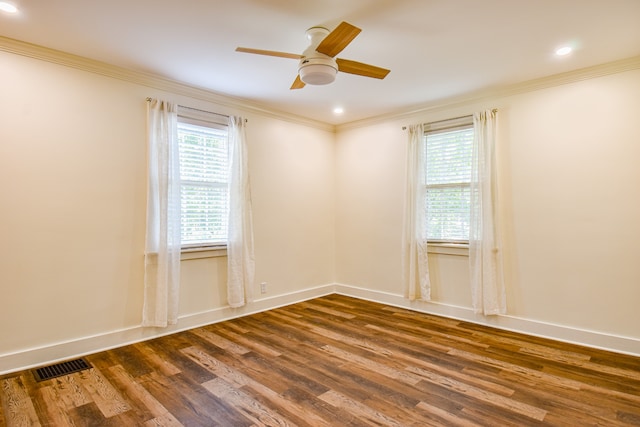 unfurnished room featuring hardwood / wood-style flooring, a healthy amount of sunlight, and ceiling fan