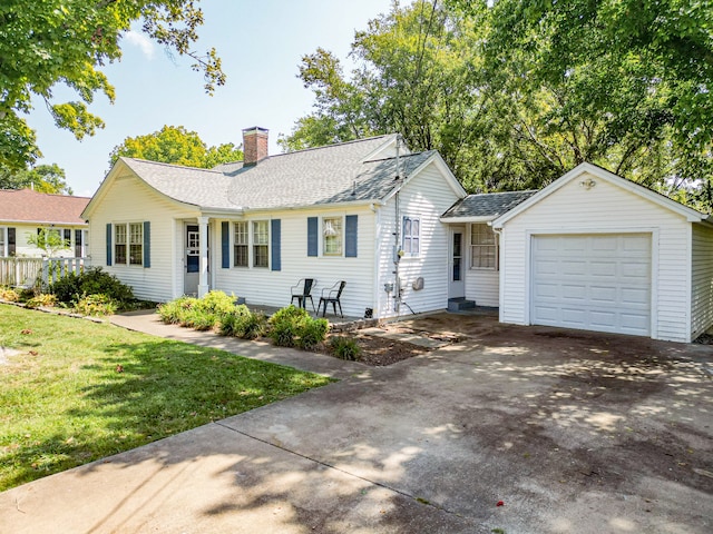 ranch-style home featuring a front yard and a garage