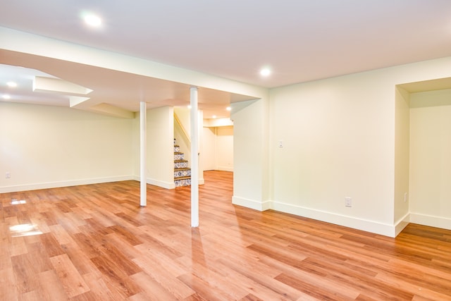 basement featuring light wood-type flooring