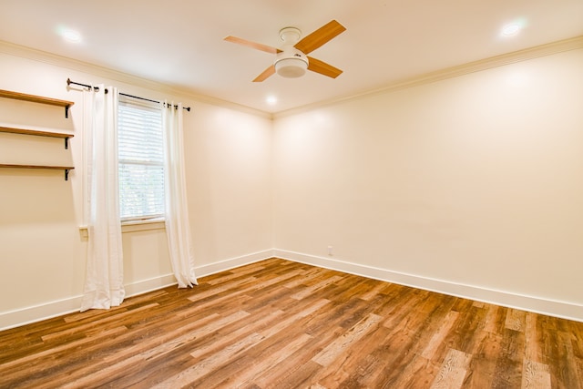 unfurnished room with ceiling fan, hardwood / wood-style floors, and ornamental molding