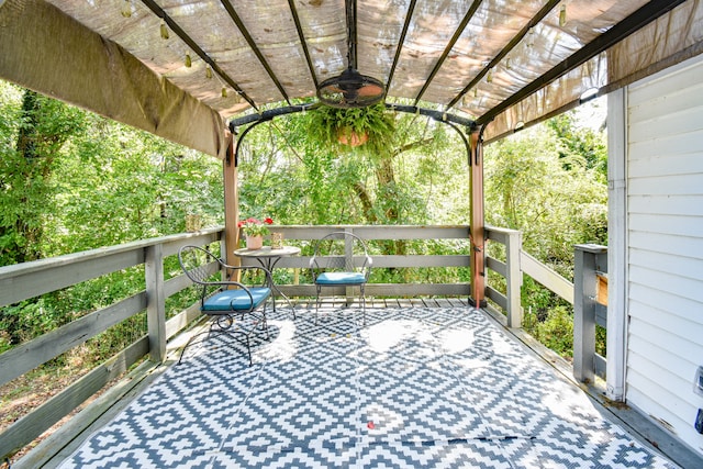 wooden deck with a pergola